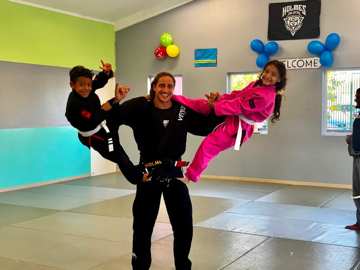Holmes and two teens between lessons